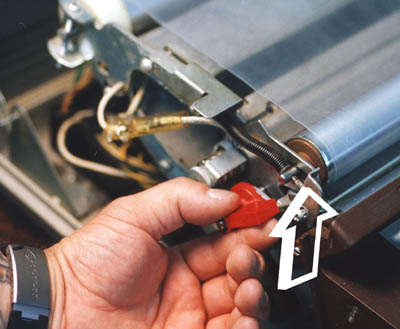To open, first rotate red knob